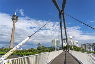 Pedestrian bridge over the Media Harbour, harbour entrance, Rhine near Düsseldorf, Rhineland, North