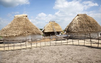 Buildings of replica Neolithic huts at the Stonehenge site, Wiltshire, England, UK