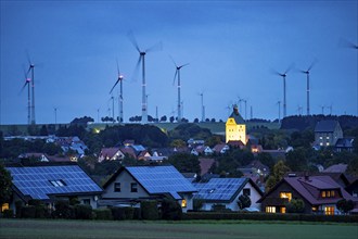 Wind farm above the village of Lichtenau, self-proclaimed energy town, houses with photovoltaic