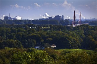 View from the Rheinpreussen spoil tip in Moers to the ThyssenKrupp plant with the bridge of the A