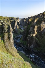 Fjaðrárgljúfur Canyon, Fjadrargljufur, rock formations in rugged deep canyon with river in the