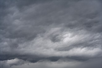 Cloudy, grey sky, rain clouds, heavy rain, bad weather, storm, dramatic cloud formation, full size,