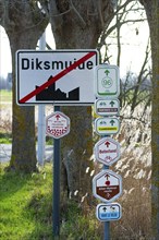 Bike node sign and 14-18 front route signposts giving directions for cycling routes, bicycle