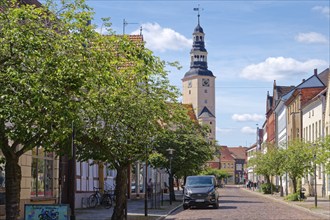 Residential and commercial buildings in Rudolf-Breitscheid-Straße, paved with cobblestones, in the