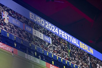 The video wall shows the tie 1:1 in the 80th minute of the match at the Adidas Fanzone at the