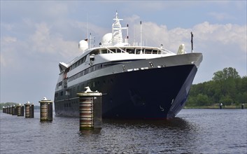 Cruise ship Clio at dolphins in the Kiel Canal, Schleswig-Holstein, Germany, Europe