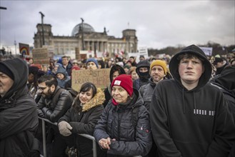 150, 000 people gather around the Bundestag in Berlin to build a human wall against the shift to