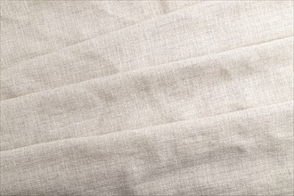 Fragment of white linen tissue. Top view, flat lay, natural textile background and texture. wave