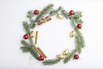 Christmas or New Year wreath composition. Decorations, balls, fir and spruce branches, on white