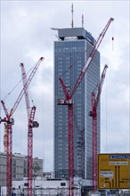 Construction cranes at Alexanderplatz, behind them high-rise Parkinn Hotel, Berlin, Germany, Europe