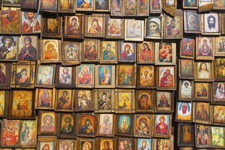 Wall full of colourful religious icons depicting various saints and religious scenes, Black Sea,