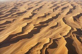 Aerial view capturing the abstract geometric patterns of a dry desert landscape, AI generated