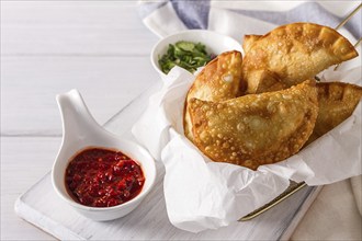 Fried chebureks, close-up, on a white background, no people