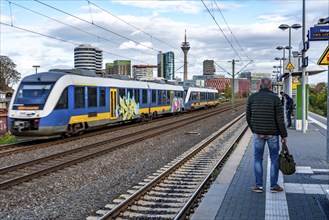 Regional express RE10 to Krefeld, Nordwestbahn, Düsseldorf city centre skyline, Medienhafen, local