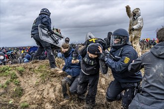 Violent clashes between thousands of demonstrators and the police, after a demonstration against