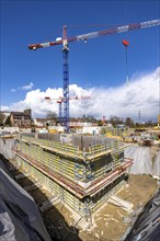 Construction site of a new residential neighbourhood, foundation of a multi-storey residential