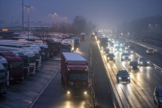 Heavy traffic on the A2 at the Bottrop-Süd service area, overcrowded lorry parking in the evening,