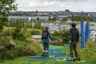 CopenHill, waste incineration plant and artificial ski slope, skiing with a view of Margretheholms