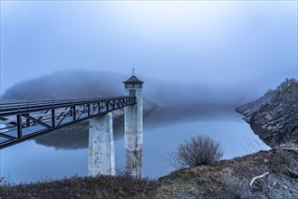 The dam wall of the Urft dam, in the Eifel, reservoir, in winter, fog, near Schleiden, North