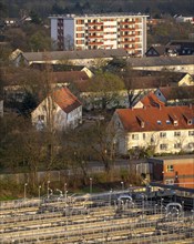 Duisburg-Huckingen sewage treatment plant, residential buildings in the Huckingen district, North