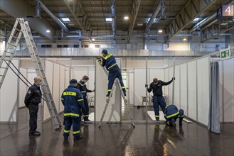 Construction of a vaccination centre for corona vaccinations, in a hall at Messe Essen, by the