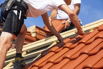 Roofing work, re-roofing of a tiled roof