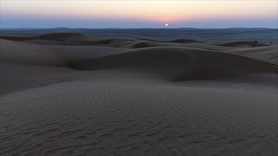 Sunrise in the sand dunes of the Rub al Khali desert, Dhofar province, Arabian Peninsula, Sultanate