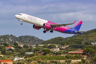 A Wizzair Airbus A321neo aircraft with the registration 9H-WAI at Skiathos Airport, Greece, Europe