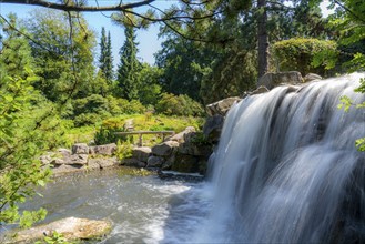 Grugapark, Essen, botanical garden, park for leisure and recreation, waterfall in the Alpinum,