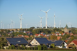 Wind farm above the village of Lichtenau, self-proclaimed energy town, houses with photovoltaic