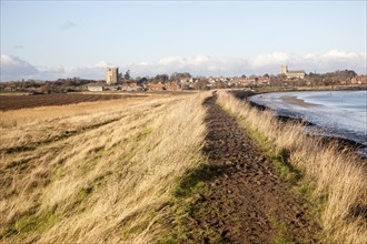 View of the village and castle looking across fields, Orford, Suffolk, England, United Kingdom,