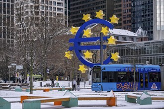 Winter in Frankfurt, euro sculpture at Willy-Brandt-Platz, snow-covered, Hesse, Germany, Europe