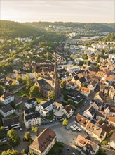 Aerial view of the town centre with striking church tower and surrounding buildings in the evening