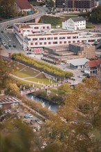 Town view with modern buildings, green areas, streets and cars, near a river, Horb, Black Forest,