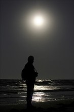 Photographer, Full moon by the sea, Baltic Sea, September, Mecklenburg-Vorpommern, Germany, Europe