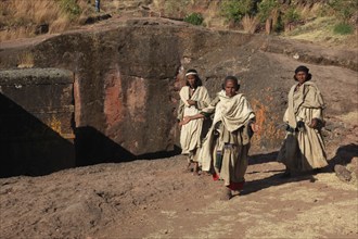 Rock churches in Lalibela, pilgrims visit the rock church of St George, Bete Kiddus Georiys, Bete