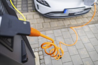 Electric cars at charging stations, Dresden, Saxony, Germany, Europe