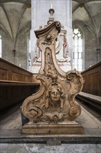 Artfully carved church pew, baroque carving in the nave of Salem Minster, Salem, Lake Constance,