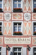 Artfully decorated façade of the Hotel Bären in the historic city centre of Freiburg im Breisgau,