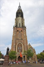 Historic city centre of Delft, New Church, Nieuwe Kerk on the market square with Hugo Grotius