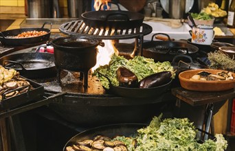 Argentina, San Telmo market restaurants offering parilla grilled meat traditional cuisine ., South