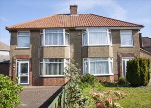 Front view of two 1930s semi-detached houses, Ipswich, Suffolk, England, United Kingdom, Europe