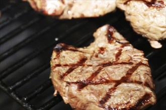 Steak on the grill with diamond pattern