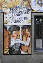 Historic ceramic tiles picture on restaurant wall, Calle Cava Baja, La Latina, Madrid, Spain,