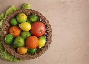 Assortment, citrus fruits, in a basket, close-up, top view, no people