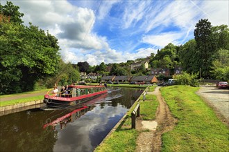 Tourists on narrowboat, canal boat, Llangollen Canal, Llangollen, Trevor, Wrexham, Wales, Great