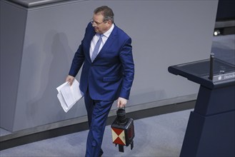 Andreas Mattfeldt, MdB, CDU, brings a red lantern to his speech in the German Bundestag. Berlin, 01