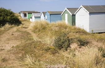 Beach huts in the sand dunes on the coast at Hunstanton, north Norfolk, England, United Kingdom,