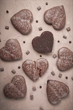 Food wallpaper, chocolate glazed gingerbread, heart-shaped, top view, no people