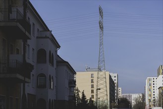 An electricity pylon stands in a residential area in Lichtenberg in Berlin, 29/02/2024